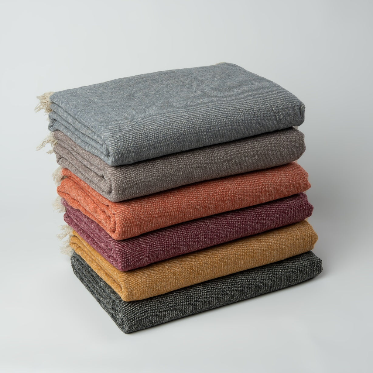Ekani Throw Blankets