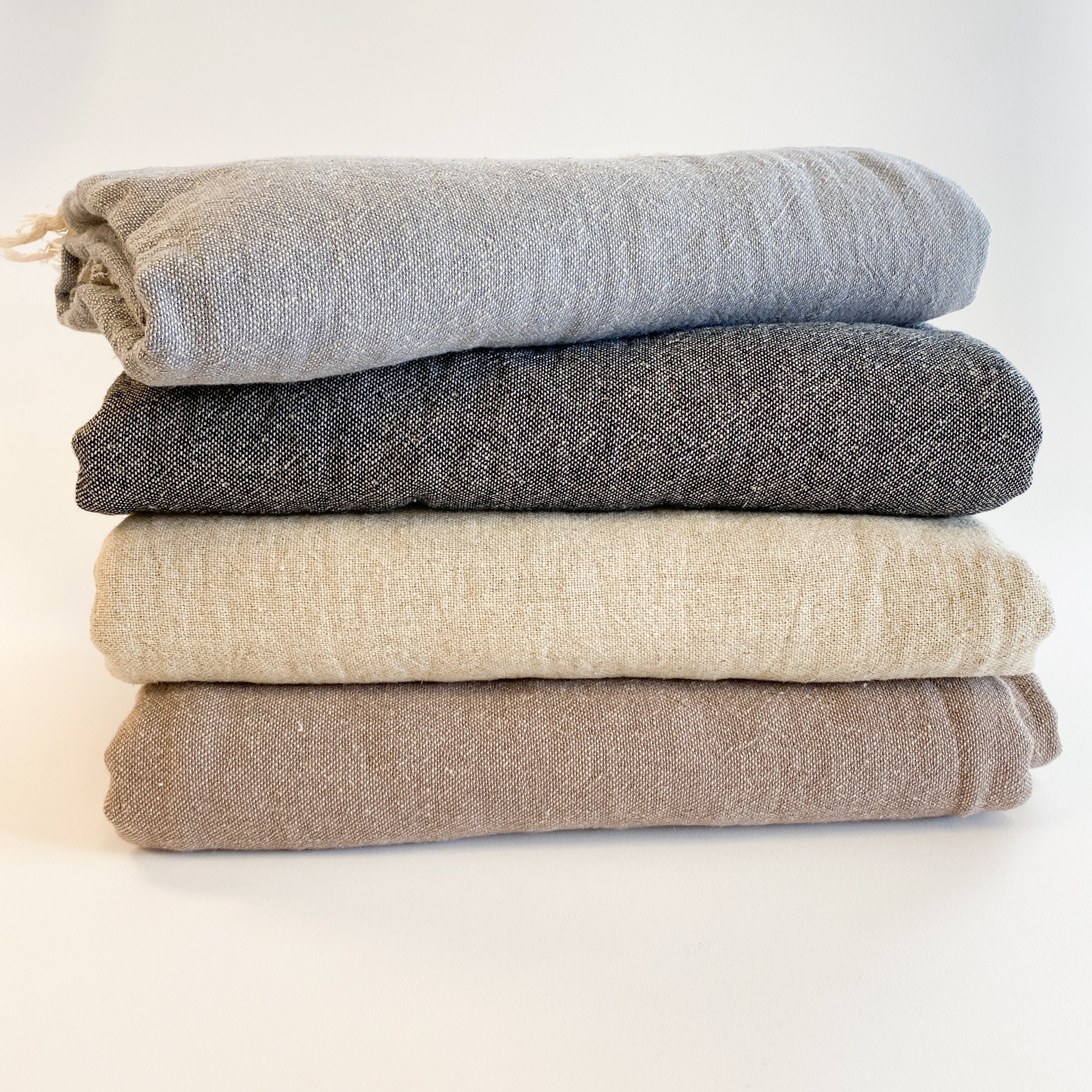 Ekani Throw Blankets