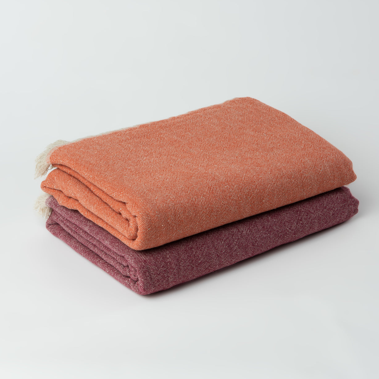 Ekani Throw Blankets